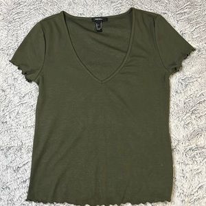 Really cute green top in size Medium